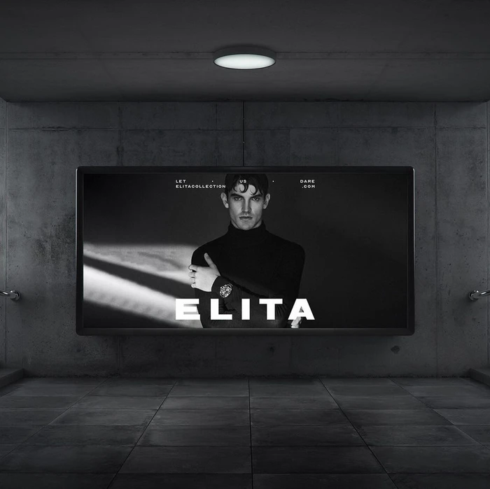 Digital billboard in a concrete underpass displaying a black and white portrait of a man wearing a turtleneck and a luxury watch.