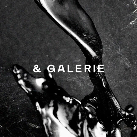 Abstract black and white image featuring a liquid cascade against a textured background, with the text '& GALERIE' centrally positioned.