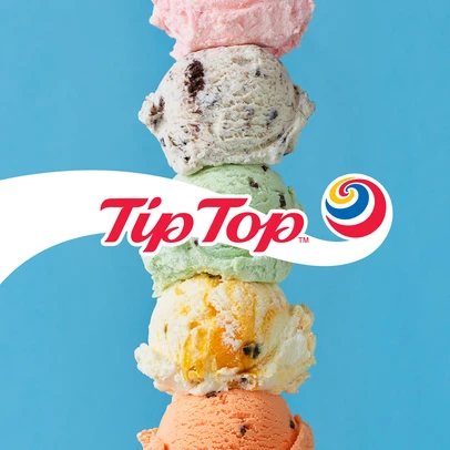 Stacked ice cream scoops of various flavors against a light blue background, featuring the 'Tip Top' logo.