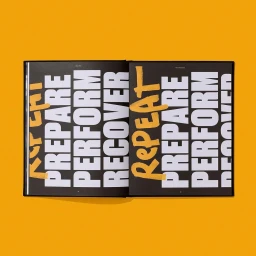 Open book with black pages and bold white typography reading PREPARE PERFORM RECOVER, on yellow background