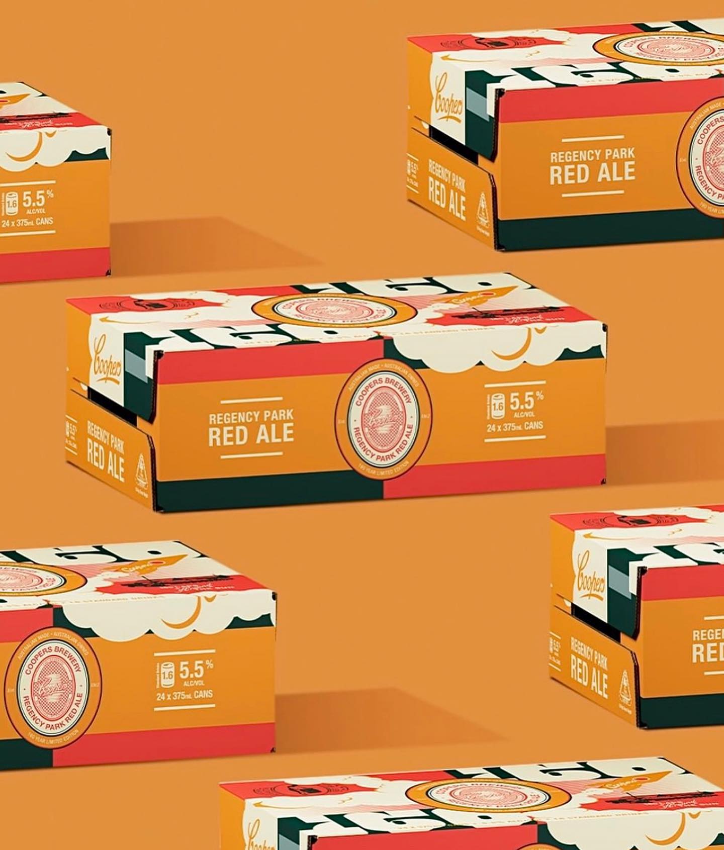 Several sealed cardboard cases of Coopers Brewery Regency Park Red Ale sit on an orange backdrop in a repeating, staggered pattern.