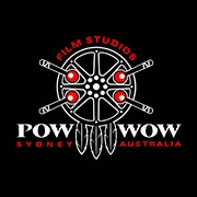 Pow Wow Film Studios logo with a circular film reel graphic, drumsticks, and feathers in white and red on black.