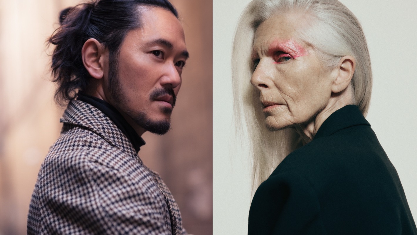 Portrait of an Asian man in a houndstooth jacket alongside an older Caucasian woman with silver hair and pink eyeshadow.