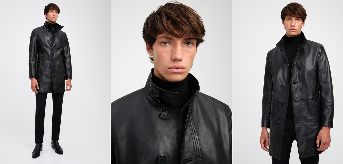 Fashion shot of a male model wearing a black leather trench coat and dark pants against a neutral backdrop, focusing on stylish outerwear.