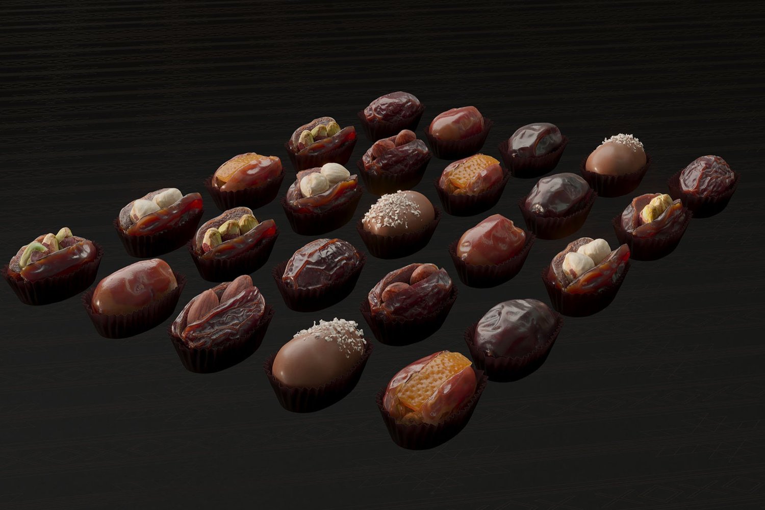 High-angle studio shot displaying twenty-three date candies with varied toppings and fillings, arranged on a reflective black surface.