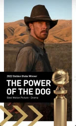 Benedict Cumberbatch wearing a cowboy hat outdoors with a golden globe award in foreground and rolling hills behind
