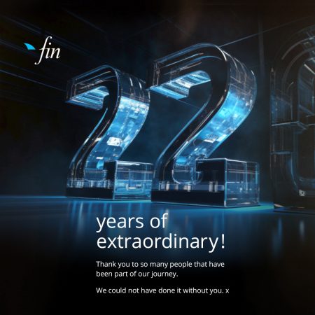 Crystal number 22 logo with 'years of extraordinary' text underneath for an anniversary announcement in a dark studio setting.