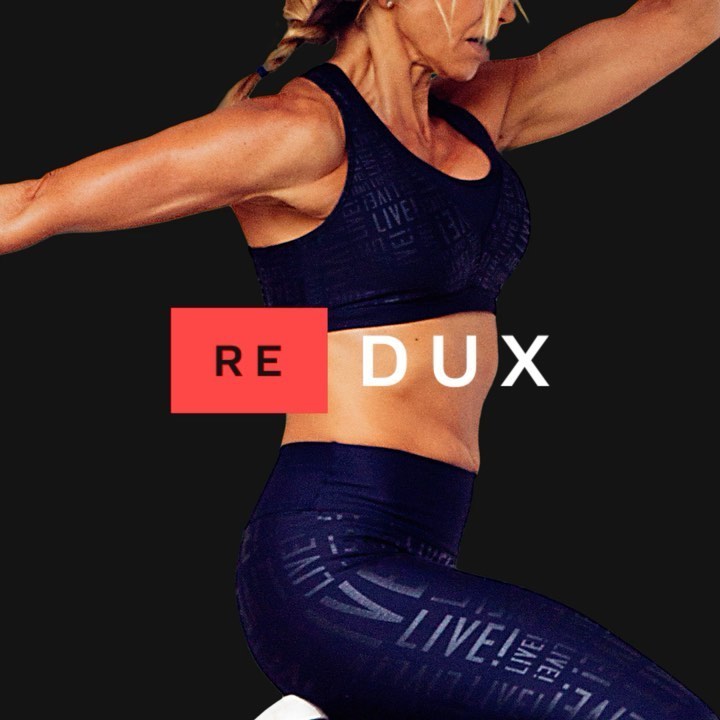 Athletic woman jumping in sports bra and leggings in a studio setting. The word 'REDUX' is overlaid on a dark gray background.