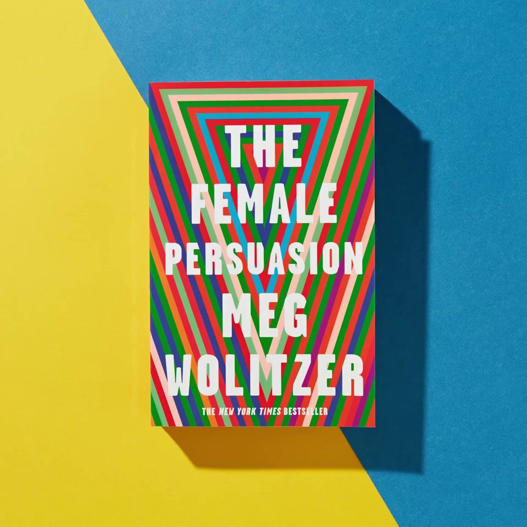 Book titled "The Female Persuasion" by Meg Wolitzer with colorful triangle design on a yellow and blue background.