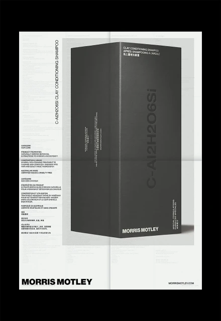 Morris Motley clay conditioning shampoo in packaging against a white paper backdrop with visible typography and studio lighting.