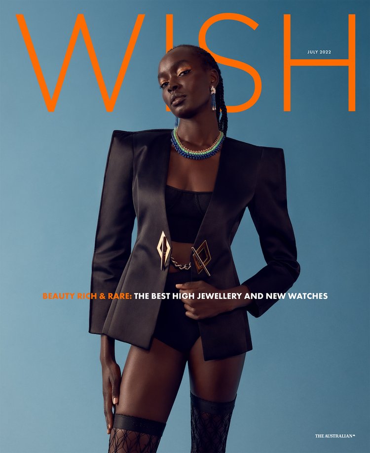 Magazine cover featuring a Black fashion model in a black blazer and hosiery, showcasing jewelry. 'Wish' magazine, July 2022 edition.