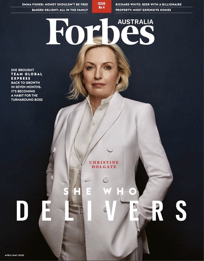 Forbes Australia magazine cover featuring Christine Holgate in a white suit against a dark blue background, with white and red text.