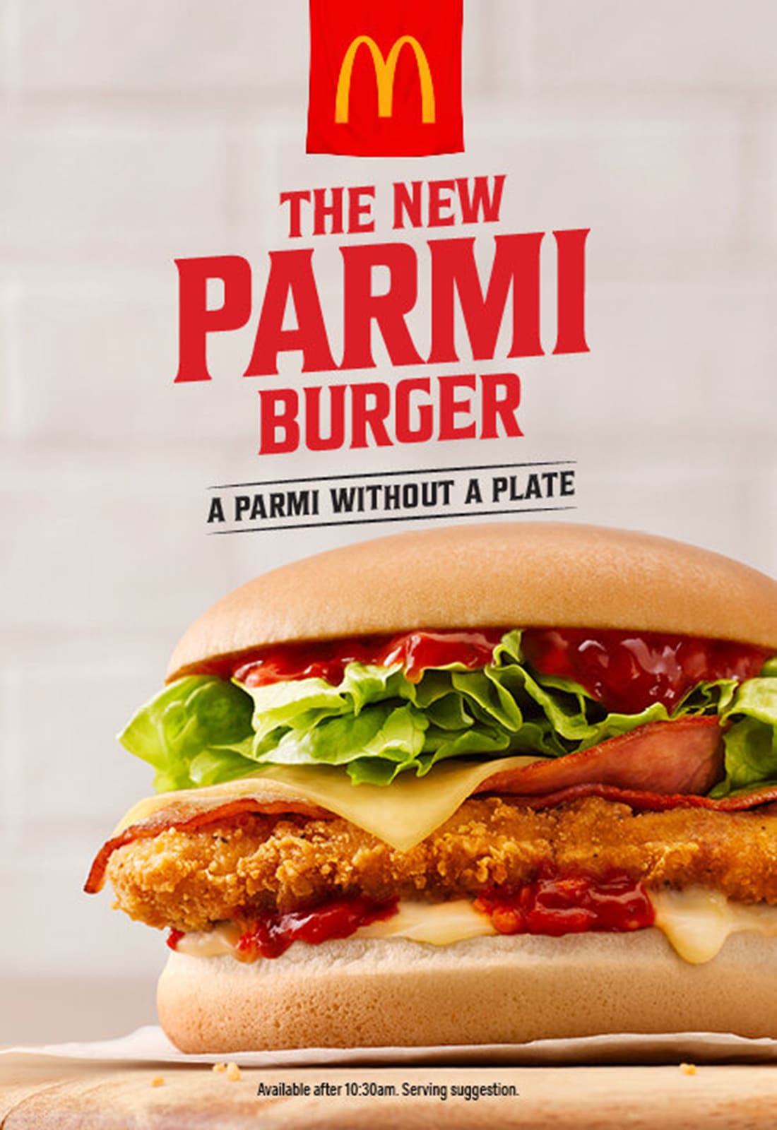 Close-up of a McDonald's Parami Burger featuring a crispy chicken patty, bacon, cheese, lettuce, and sauce on a bun, food photography.