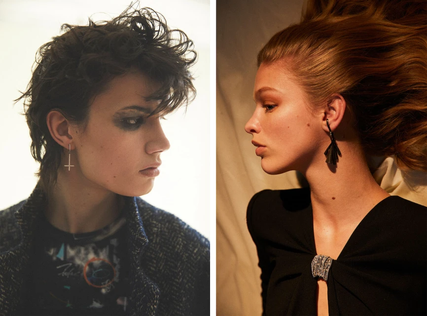 Profile portraits of two adult female fashion models wearing dark eye makeup and dark clothing, posed indoors against a neutral background.