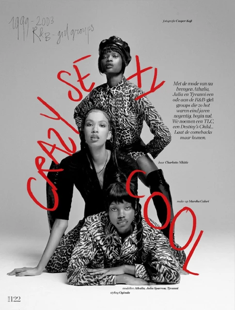 Editorial fashion shot of three Black female models in patterned clothing with a red stylized text overlay, posing against a gray background.
