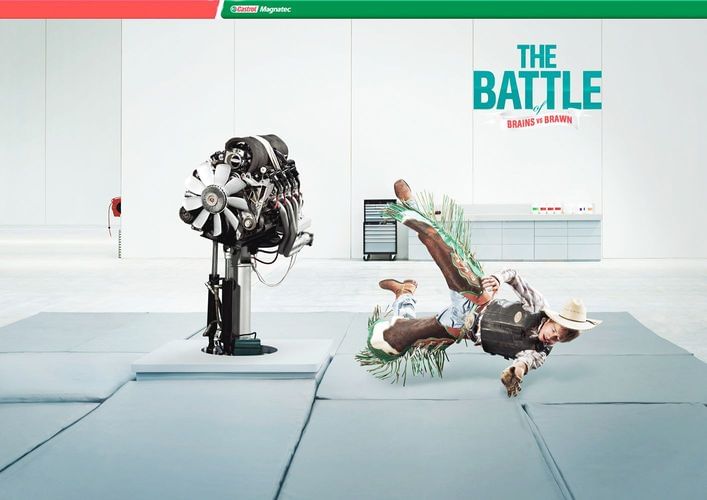 Promotional image contrasts a car engine on a stand and a falling rodeo cowboy on cushioned mats in a white studio setting.