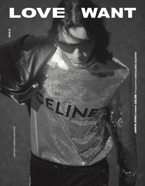 Black and white fashion shot of a person wearing a sequined top with 'CELINE' logo, captured in a studio-like environment.
