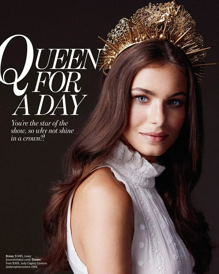Woman wearing a gold crown and white ruffled high-neck top with hair styled by Budi Juspandi in Sydney