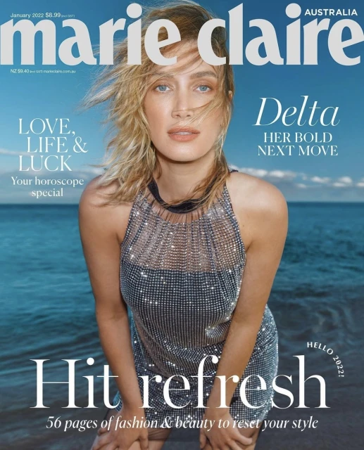 Marie Claire Australia magazine cover featuring a woman with blonde hair wearing a sparkling dress, ocean and sky in the background.