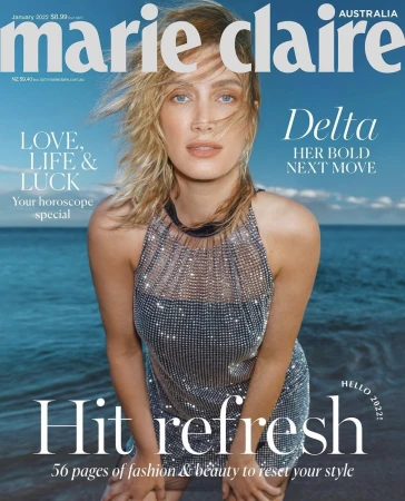 Marie Claire Australia magazine cover featuring a woman with blonde hair wearing a sparkling dress, ocean and sky in the background.