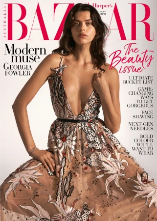 Model Georgia Fowler wearing a sheer embroidered cactus dress on a magazine cover against a plain white background.