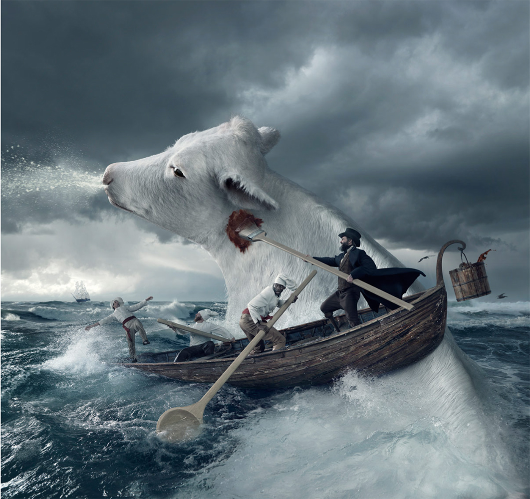 Surreal image of a large cow head emerging from ocean waves, a boat with people rowing and sailing alongside in stormy weather.
