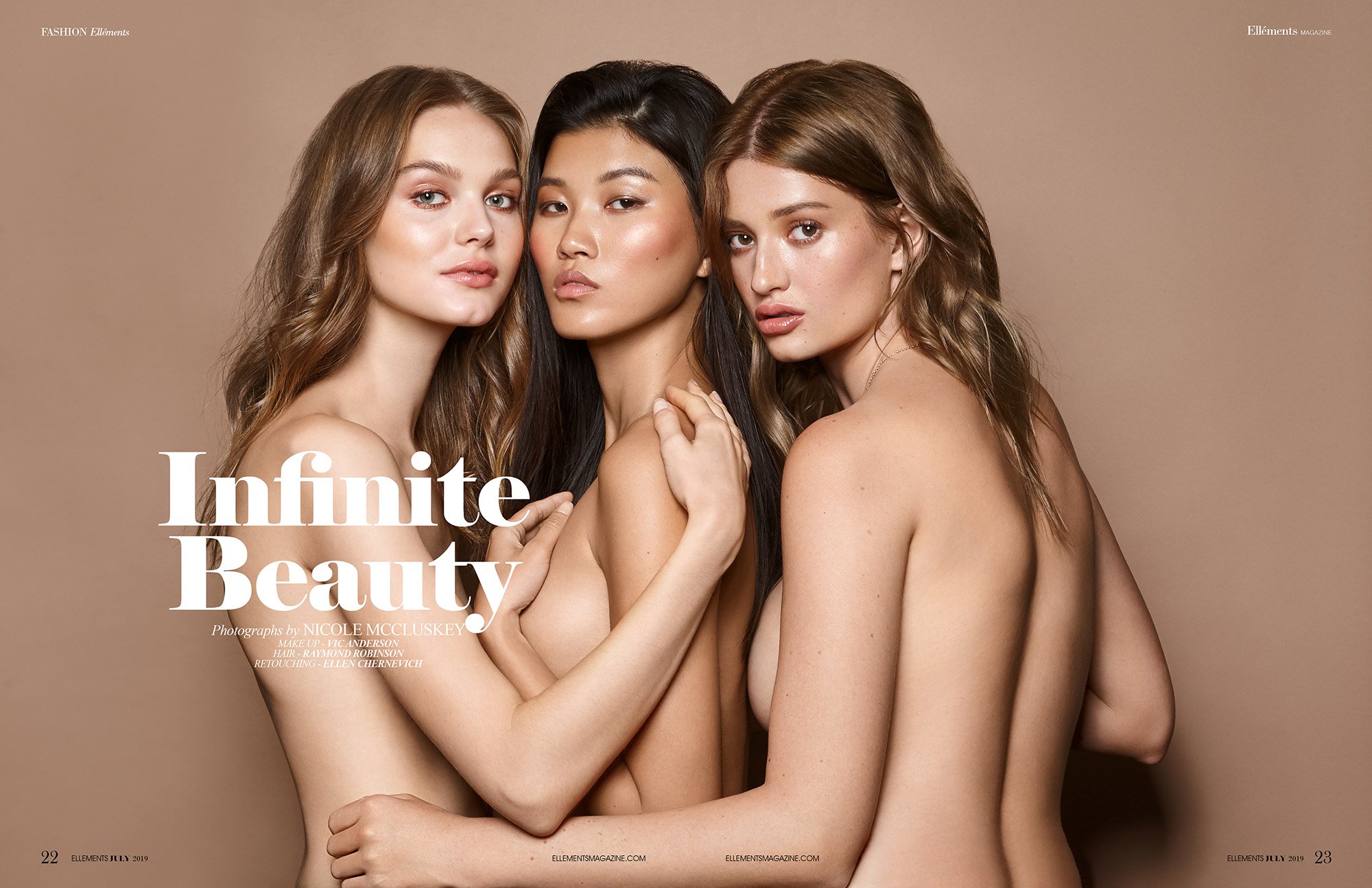 Three diverse nude women pose together in a beauty editorial shot. They are evenly lit against a light-brown background, showcasing their natural features.