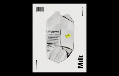 Crinkled white pouch packaging for Vegan Milk product on a grainy white background with typography and a barcode.