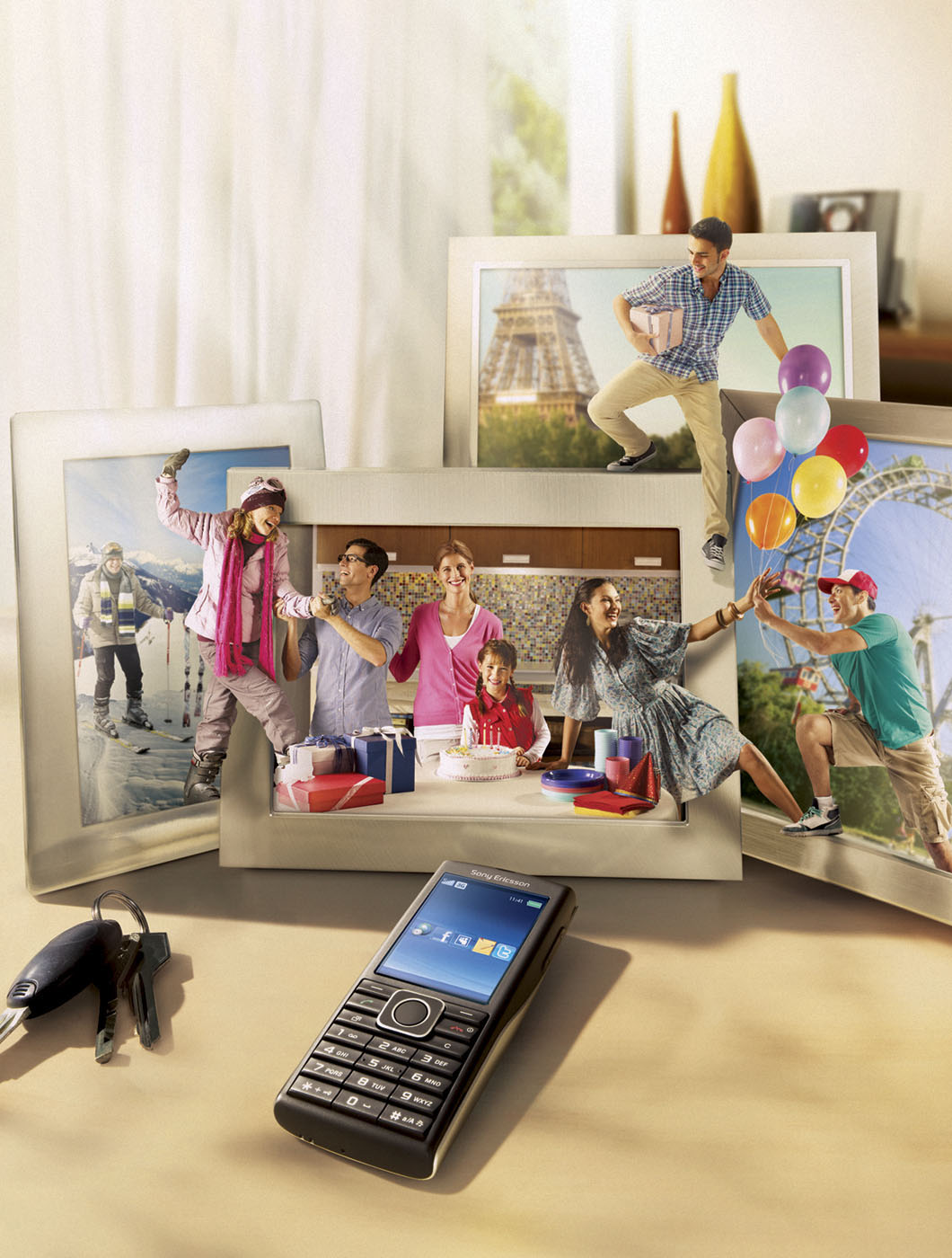 Mobile phone on a table with framed photos of diverse activities and tourist destinations; family celebration, ice skating, Paris, amusement park.