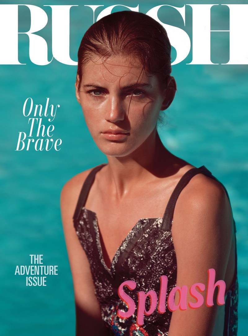 Magazine cover featuring a young woman in a black top, set against a blurred turquoise background. The magazine's title 'RUSH' is visible.
