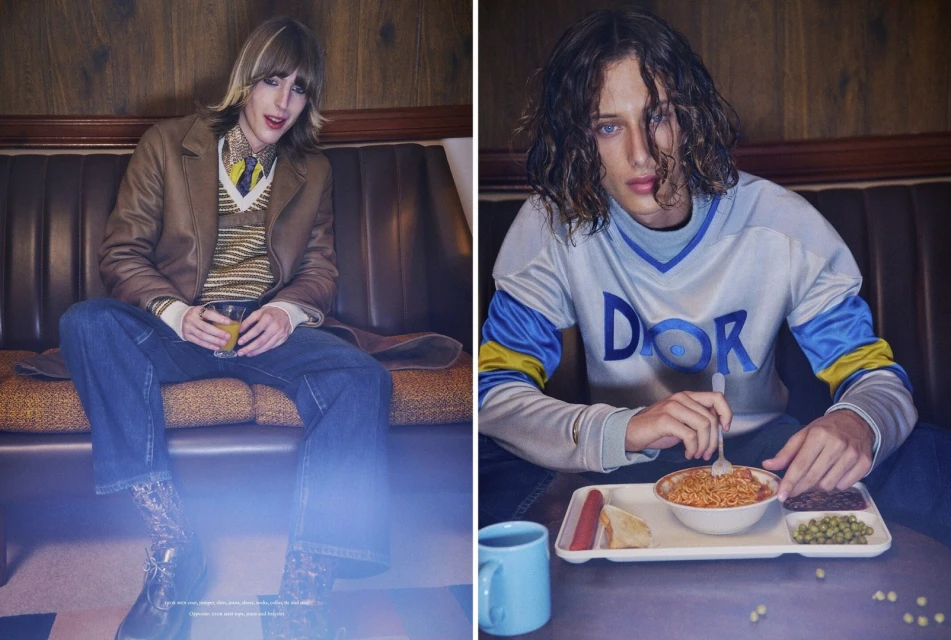 Two fashion models pose indoors on a brown couch and at a table, one holding orange juice, the other with a tray of food, in a candid scene.
