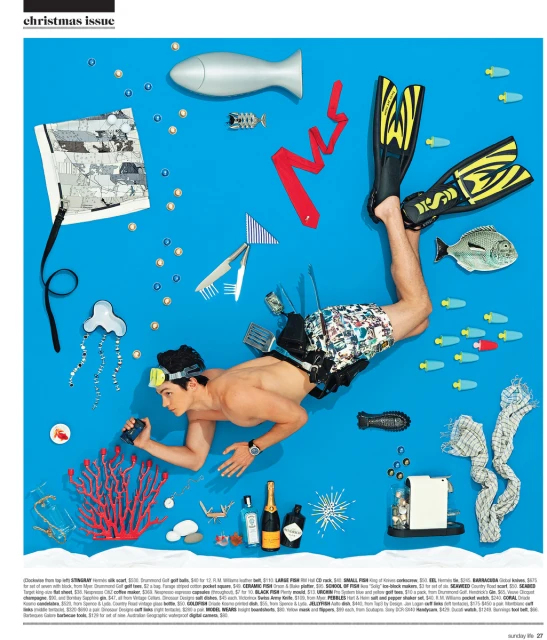 Editorial style image of a man as a scuba diver, with diving gear, fish, bottles and underwater objects on a blue background.