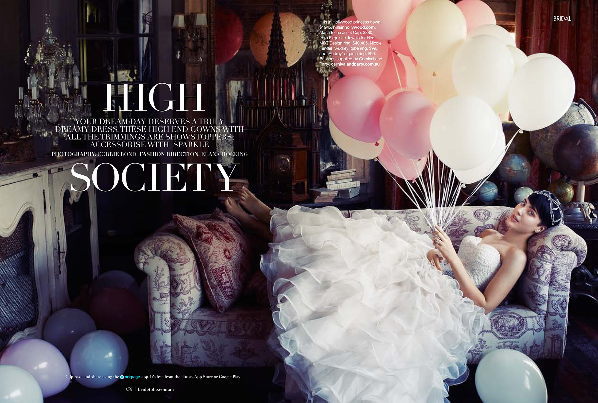 Editorial shot of a woman in a wedding dress lying on an ornate couch, holding a bunch of pink and white balloons in an indoor setting.
