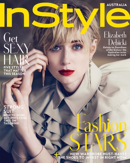 Magazine cover featuring a blonde woman with blue eyes and red lipstick, wearing a beige ruffle-collared top, with 'InStyle Australia' logo.