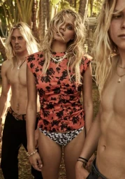 Three models with long blonde hair outdoors in Sydney styled by Lill Jenner, featuring a woman in a coral floral top.