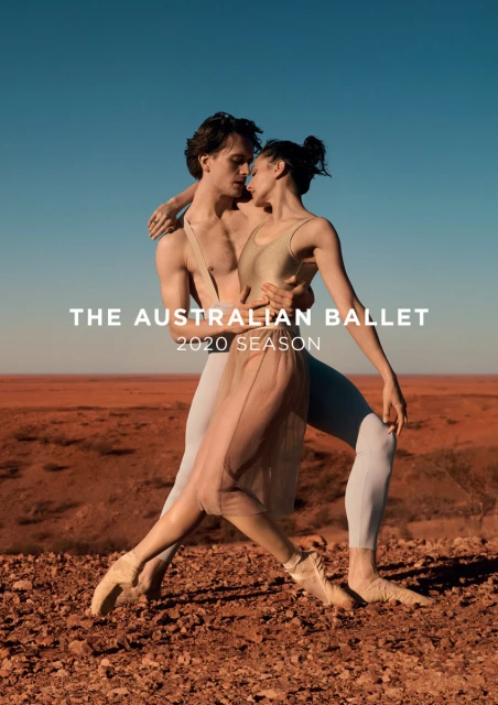 Ballet dancers pose intimately in a desert landscape in a promotional image for the Australian Ballet's 2020 season.
