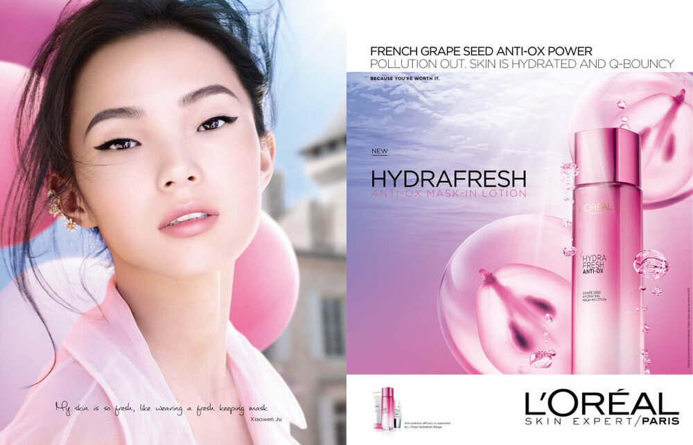 Cosmetics ad featuring an Asian woman with pink balloons and L'Oréal Hydra Fresh lotion, with text promoting French grape seed anti-ox power.