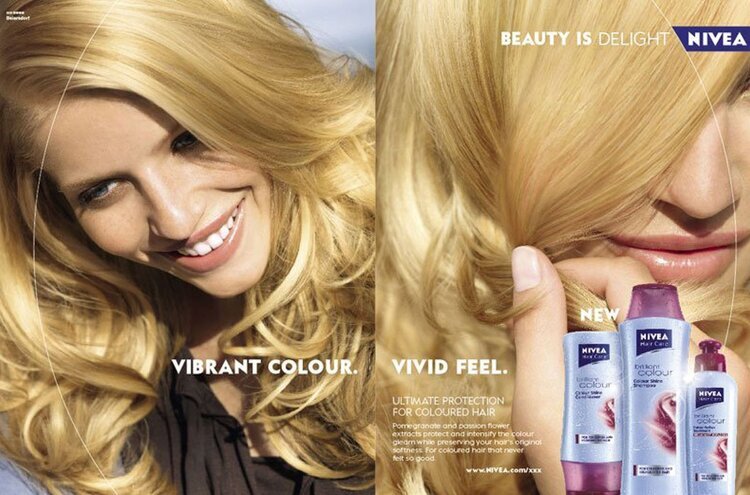 Advertisement for Nivea hair products features a smiling woman with blond hair, along with product shots and text, promoting vibrant color and vivid feel.