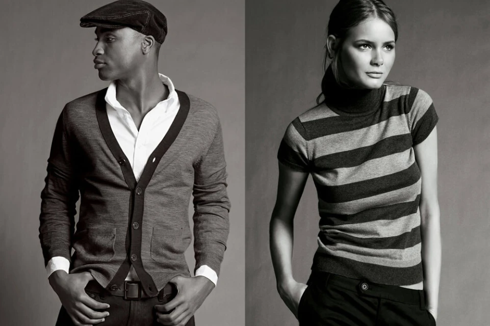 Black and white portrait of a man in a cardigan and a woman in a striped turtleneck by James Houston