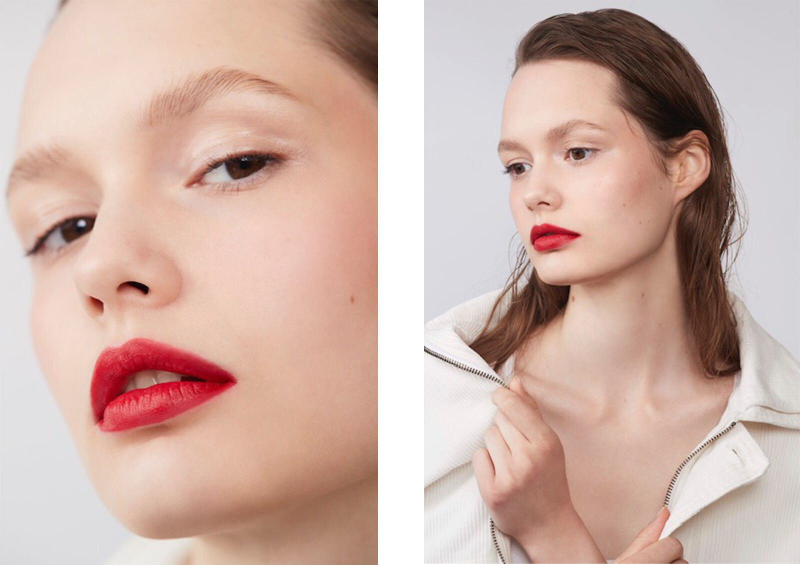 Close-up studio portrait of a beautiful young woman with red lips wearing a white corduroy jacket and minimal makeup on light gray backdrop.