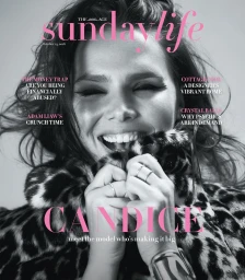 Close-up portrait of a smiling woman wearing a leopard print coat with make-up by Allison Boyle