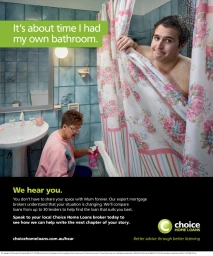 Man behind floral shower curtain and woman cleaning bathroom in advertising photograph by Andreas Bomert
