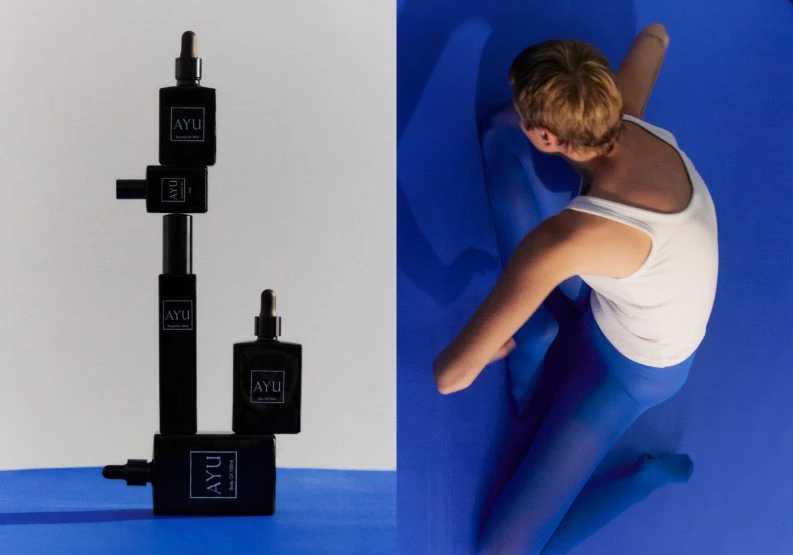 Aesthetic skincare product arrangement against a white backdrop, and a woman in blue tones against a blue backdrop create contrast.