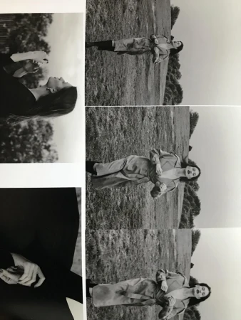 Monochrome fashion contact sheet with multiple frames showing a woman outdoors in a trench coat styled by Anastacia Bijou