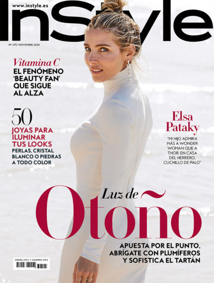 InStyle cover featuring a blonde woman in a white dress, posing in an outdoor setting, with magazine text overlay and sandy tones.