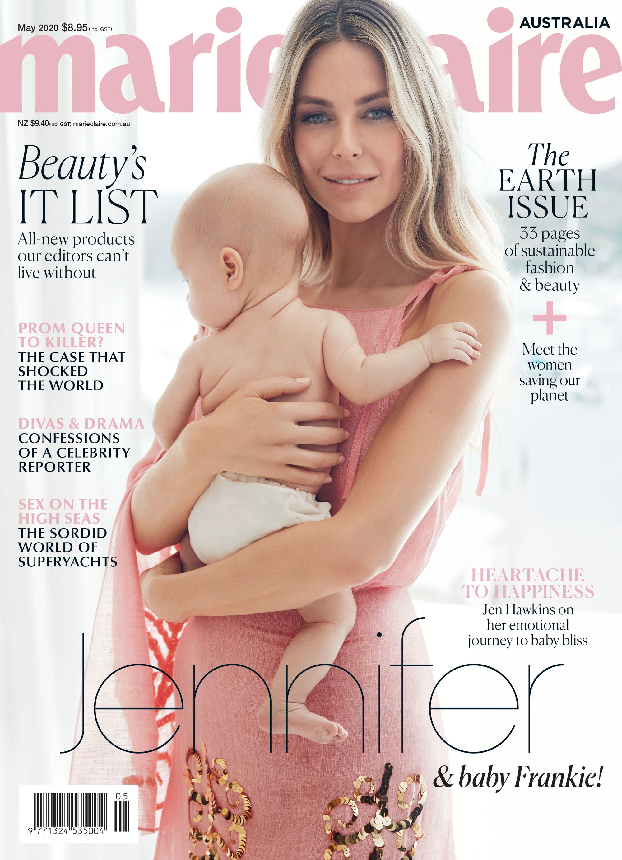 Jen Hawkins holding a baby in a pink dress for a magazine cover with pink typography overlay