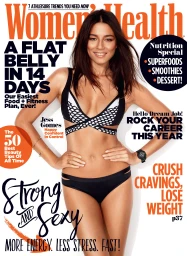 Model Jess Gomes wearing a black and white bikini against a seamless white background for a magazine cover.