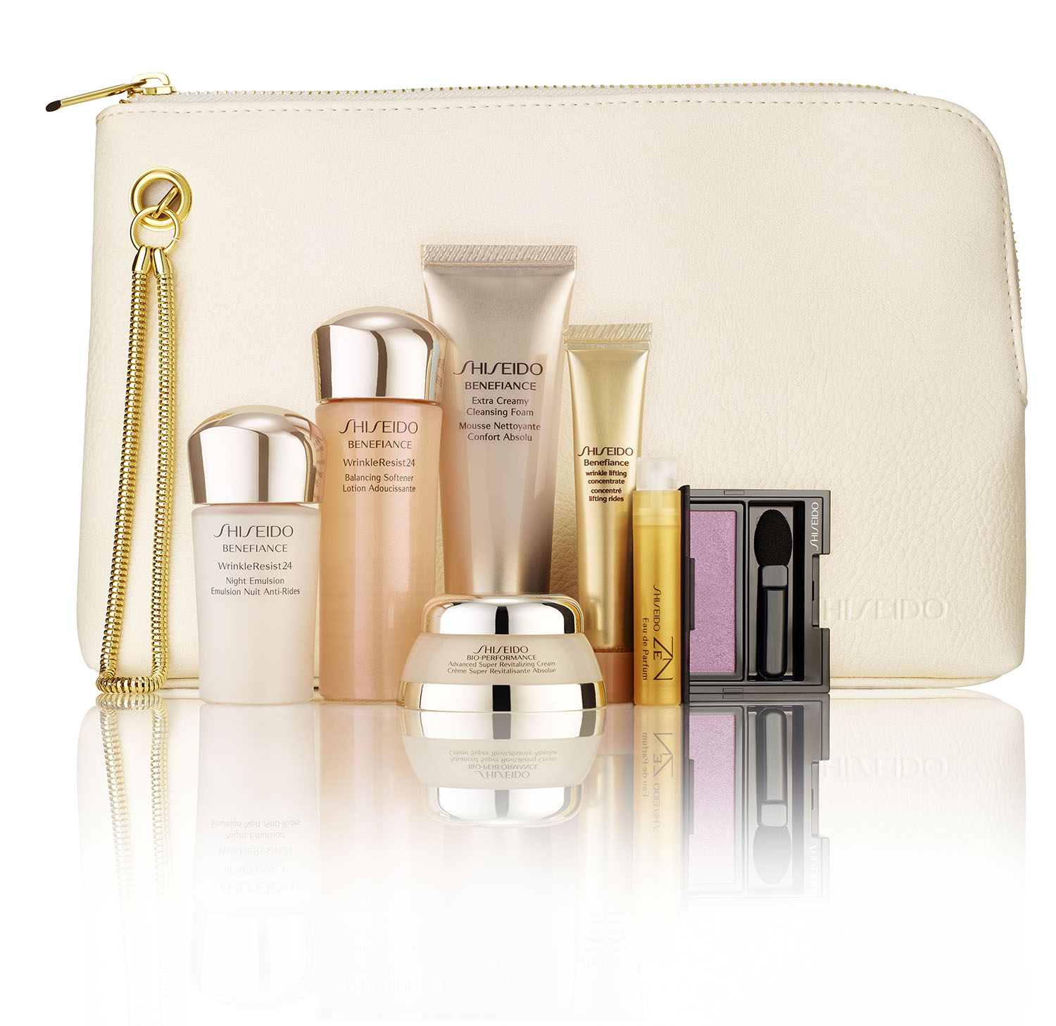 Arrangement of Shiseido Benefiance skincare products including creams, lotions, and eye shadow, presented in front of a white cosmetic bag.