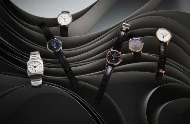 Six luxury wristwatches displayed on dark grey curved abstract paper ribbons in a commercial product layout.