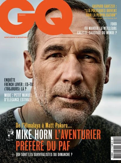 GQ France magazine cover featuring a close-up of Mike Horn, the adventurer, wearing a grey sweater, with the masthead at the top.